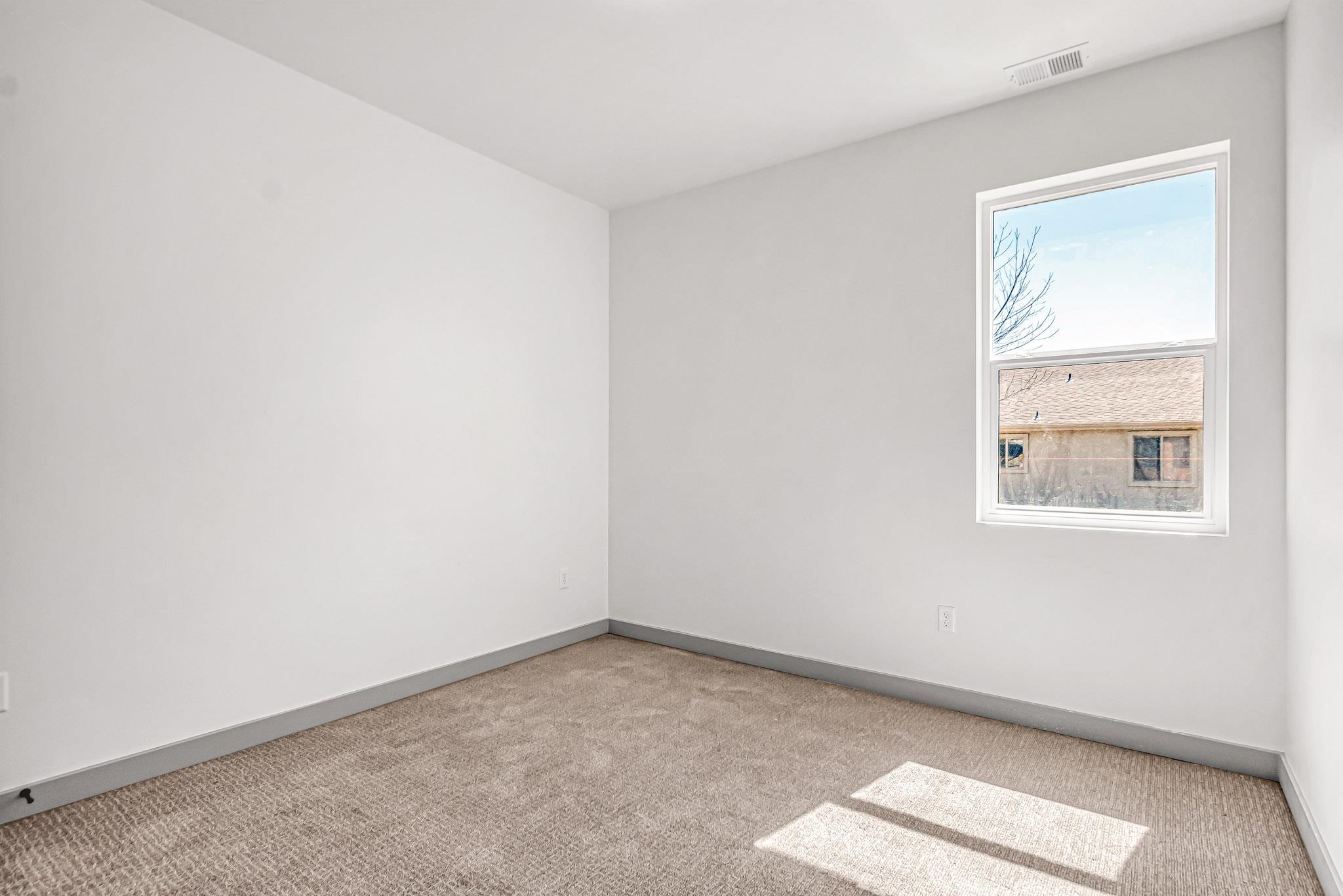 3087 Thunder Cloud Drive Grand Junction, CO 81504 - Photo 24 of 33 an empty room with a window