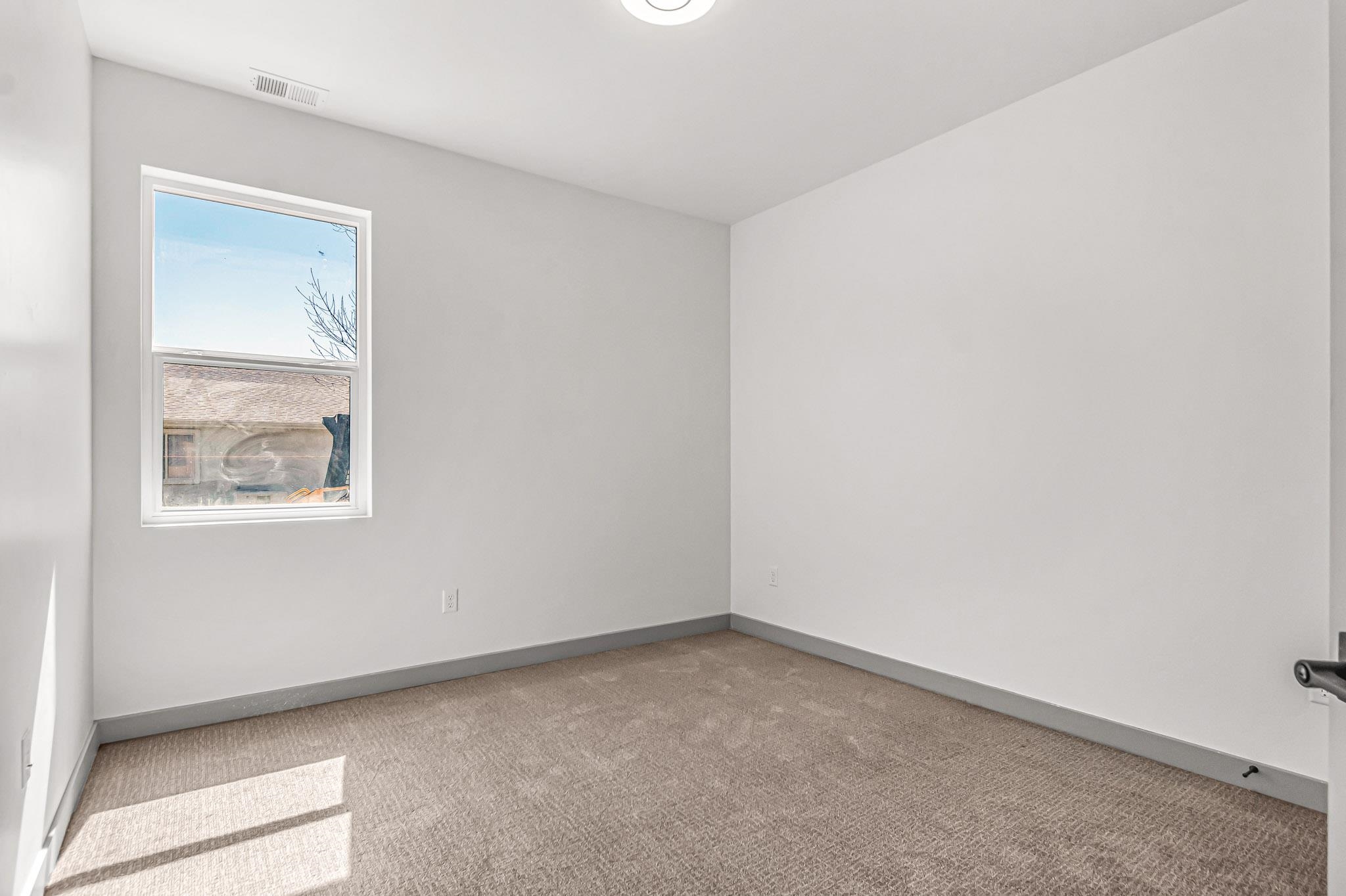 3087 Thunder Cloud Drive Grand Junction, CO 81504 - Photo 26 of 33 an empty room with a window