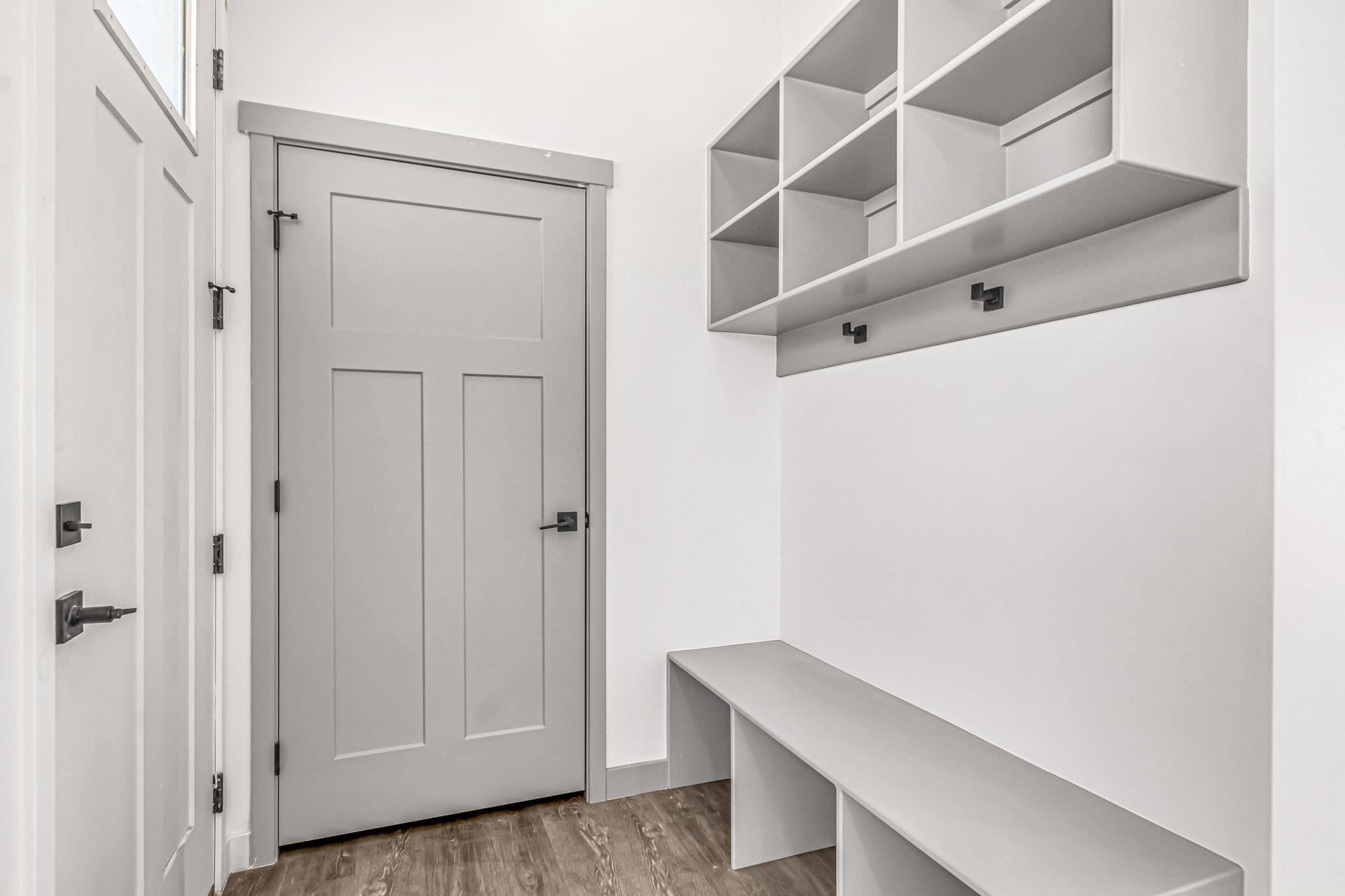 3087 Thunder Cloud Drive Grand Junction, CO 81504 - Photo 3 of 33 a room with white door and wooden floor