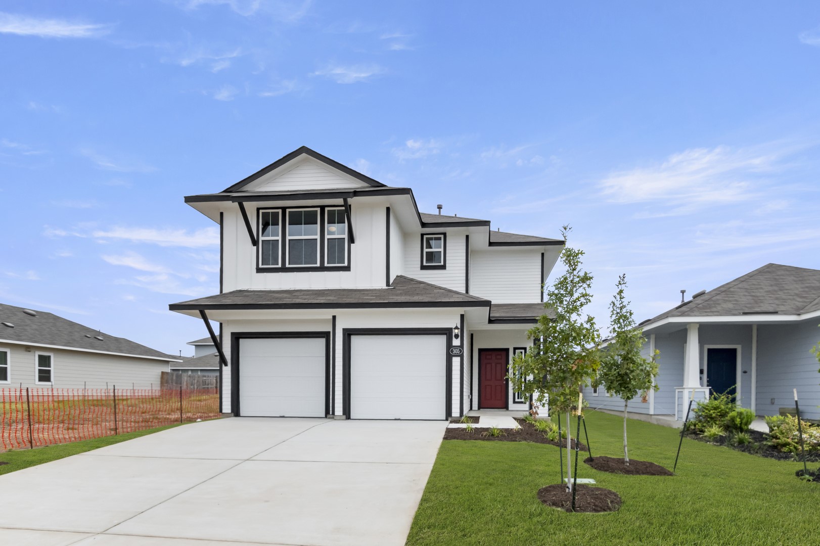 a house view with a garden space