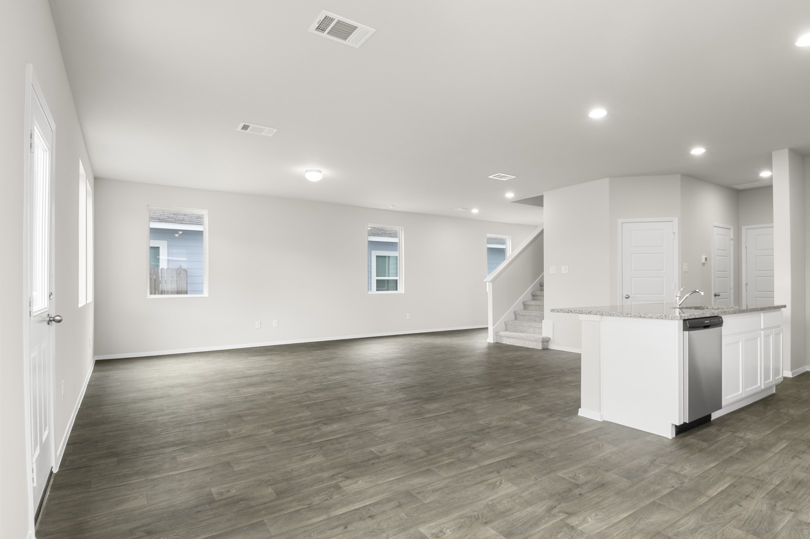305 Jade Street Maxwell, TX 78656 - Photo 11 of 32 a view of an empty room with wooden floor and a window