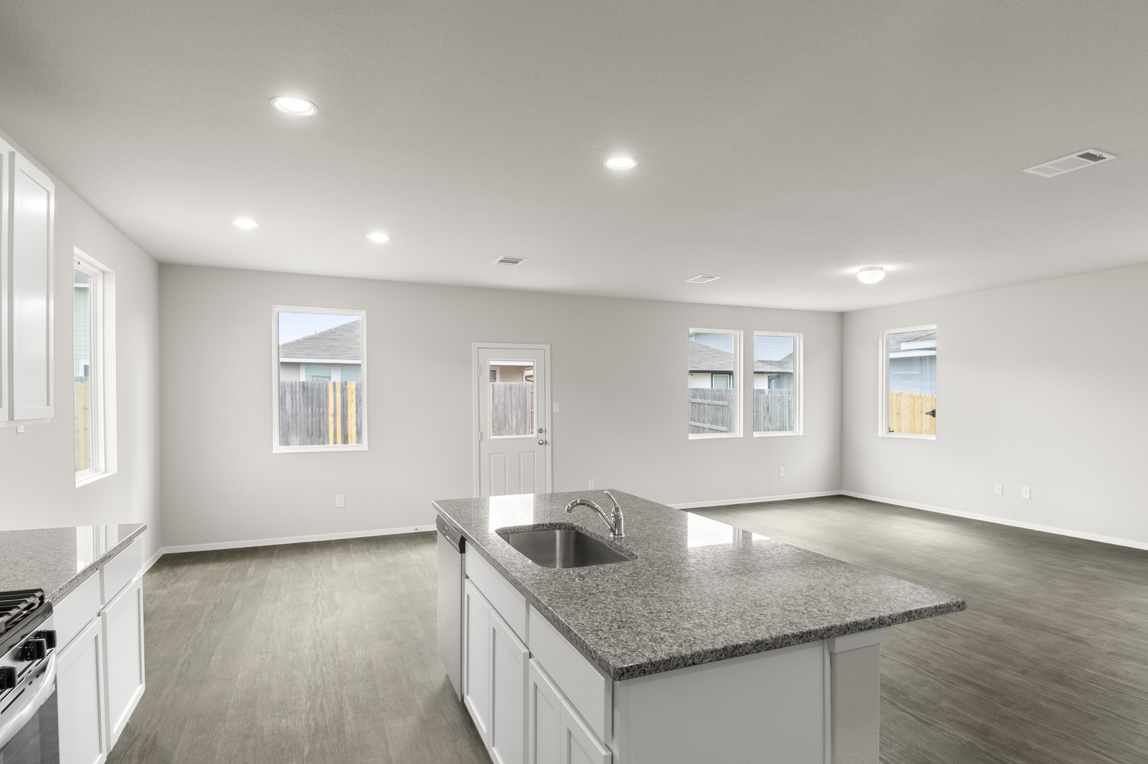 305 Jade Street Maxwell, TX 78656 - Photo 16 of 32 an open kitchen with sink and natural light
