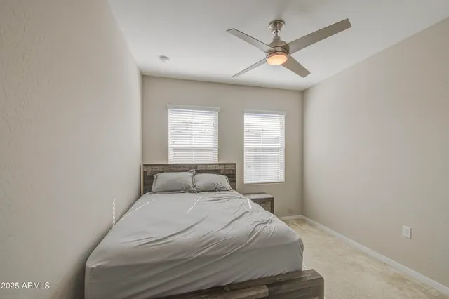 a bathroom with a sink toilet and mirror