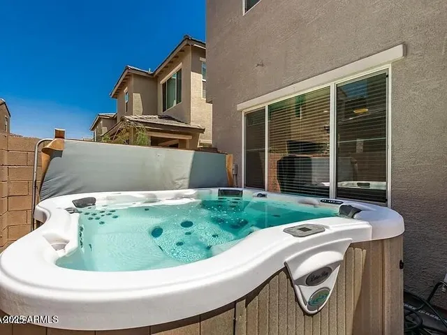 a view of yard with swimming pool