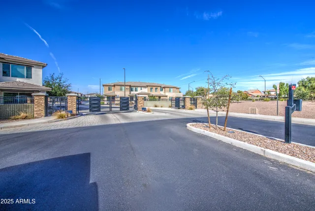 a view of a swimming pool with a lounge chairs