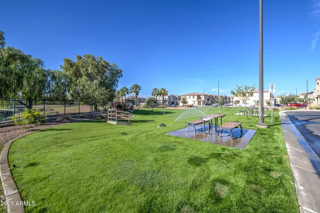 a view of swimming pool with outdoor seating
