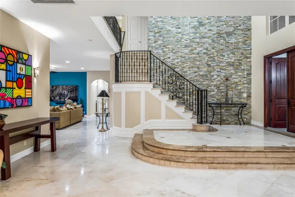 a view of entryway livingroom and hall