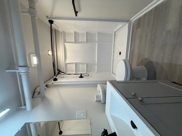 a view of a pathway with a garden