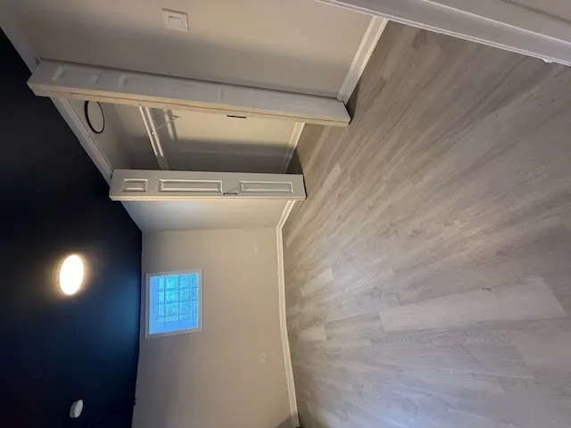 a kitchen with a refrigerator and a sink