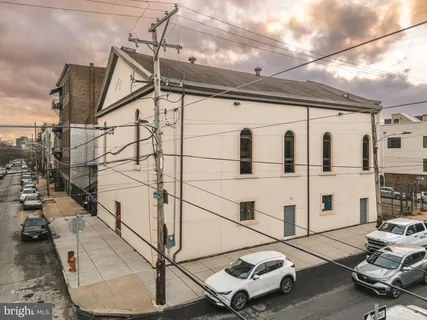 a car parked in front of a house