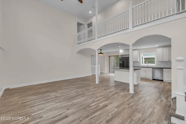 a kitchen with stainless steel appliances granite countertop a stove and a sink