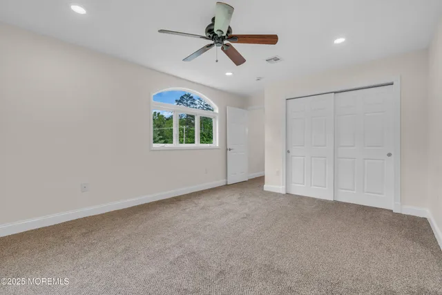 a bathroom with a tub and shower