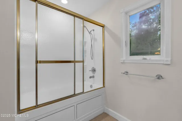 a view of backyard with outdoor seating and green space