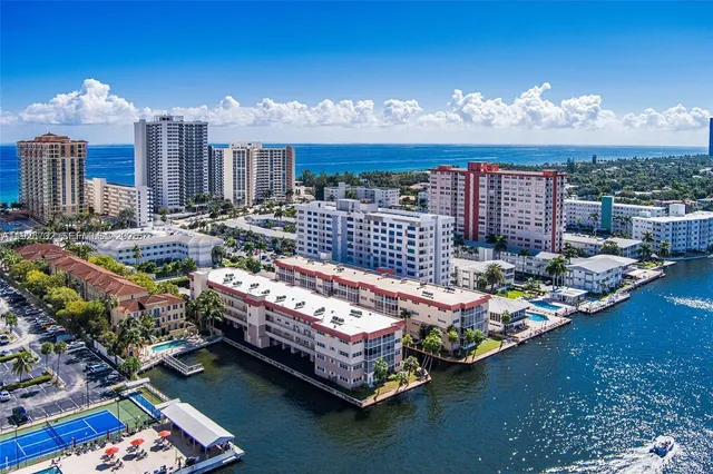 a view of a balcony with chairs