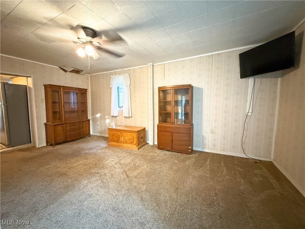 8756 Cook Road Salem, OH 44460 - Photo 31 of 50 Unfurnished bedroom featuring carpet flooring and ceiling fan