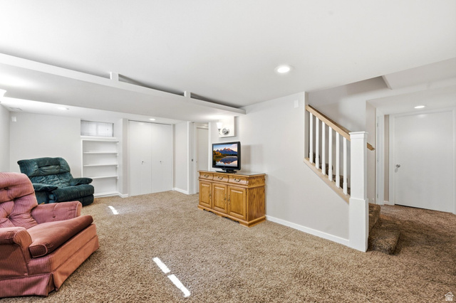 310 East 600 South Centerville, UT 84014 - Photo 18 of 41 Spacious carpeted room featuring white walls and recessed lighting