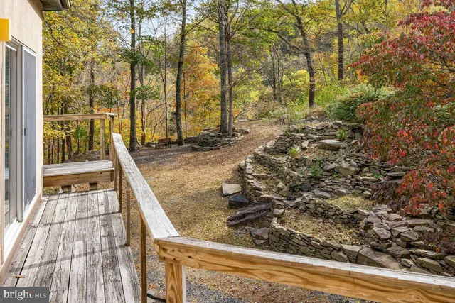an aerial view of a house with swimming pool