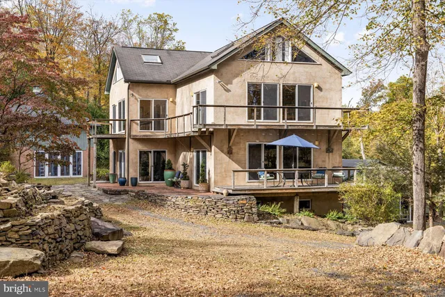 a kitchen with a refrigerator and a sink