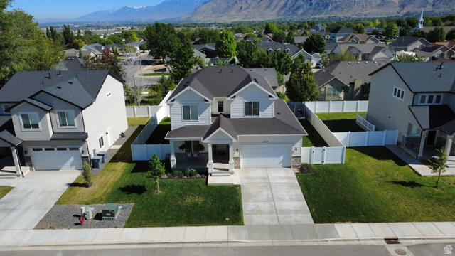 2664 West Maple Street Mapleton, UT 84664 - Photo 48 of 49 Contemporary two-story residence featuring white siding and a dark shingled roof
