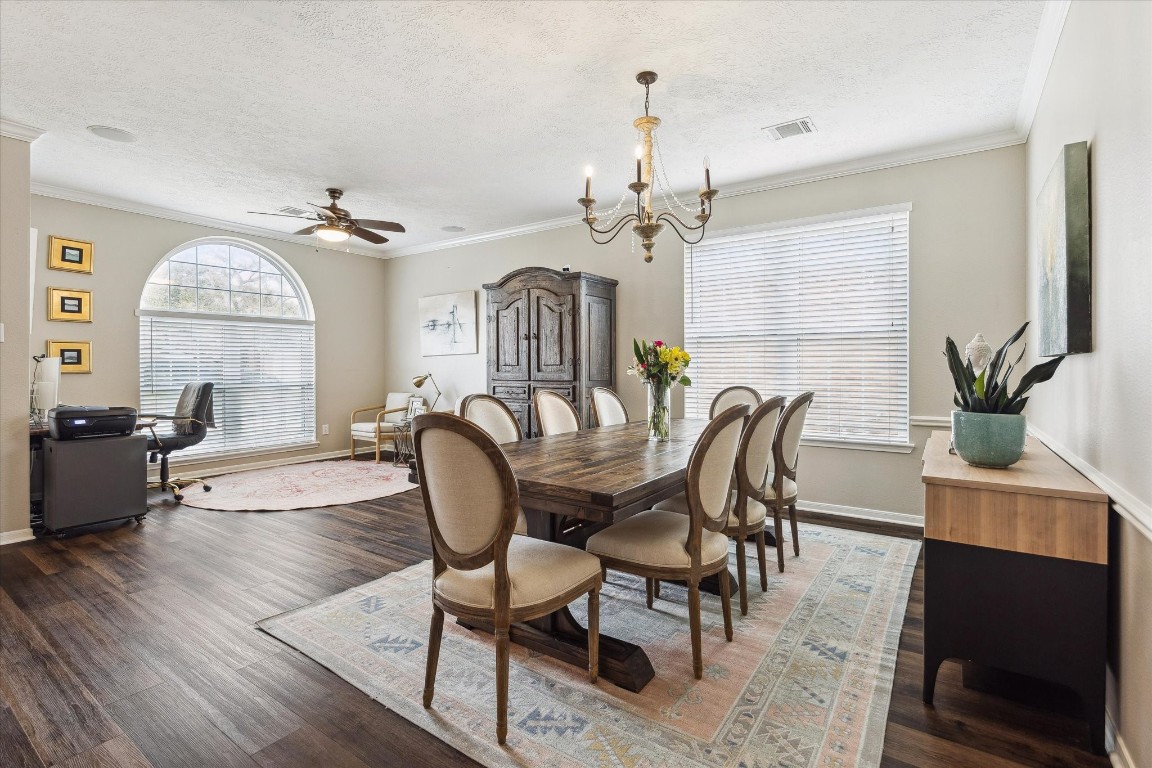 9831 Therrell Drive Houston, TX 77064 - Photo 11 of 44 a view of a a dining room with furniture window and wooden floor