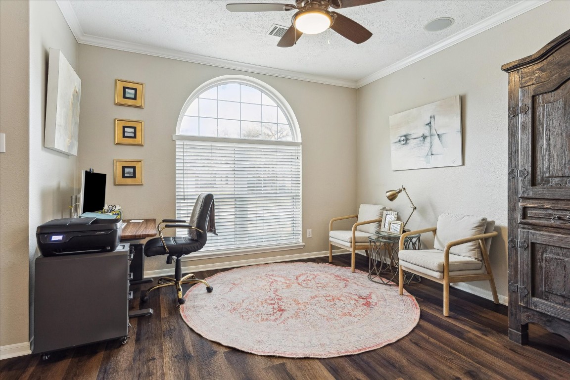 9831 Therrell Drive Houston, TX 77064 - Photo 12 of 44 a workspace with furniture hardwood and a window