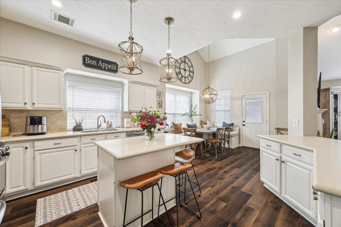 9831 Therrell Drive Houston, TX 77064 - Photo 14 of 44 a open kitchen with sink cabinets and stainless steel appliances