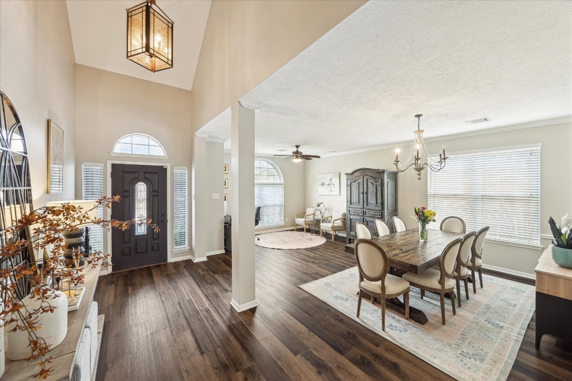 9831 Therrell Drive Houston, TX 77064 - Photo 9 of 44 a dining room with furniture window and wooden floor