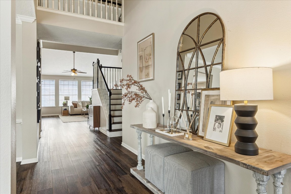 9831 Therrell Drive Houston, TX 77064 - Photo 10 of 44 a view of entryway and hall with wooden floor