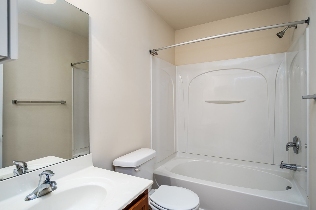 1809 Grace Point Road Morrisville, NC 27560 - Photo 19 of 22 Full Bath in hallway with tub shower combo. Linen closet in hall for more storage. Hall Bath