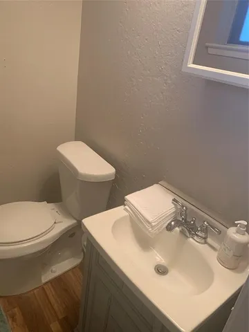a bathroom with a sink and a toilet