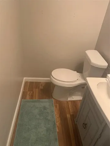 a bathroom with a toilet and a sink