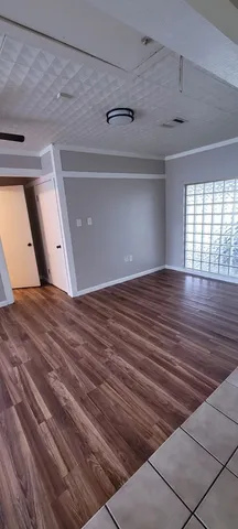 a view of an empty room and window