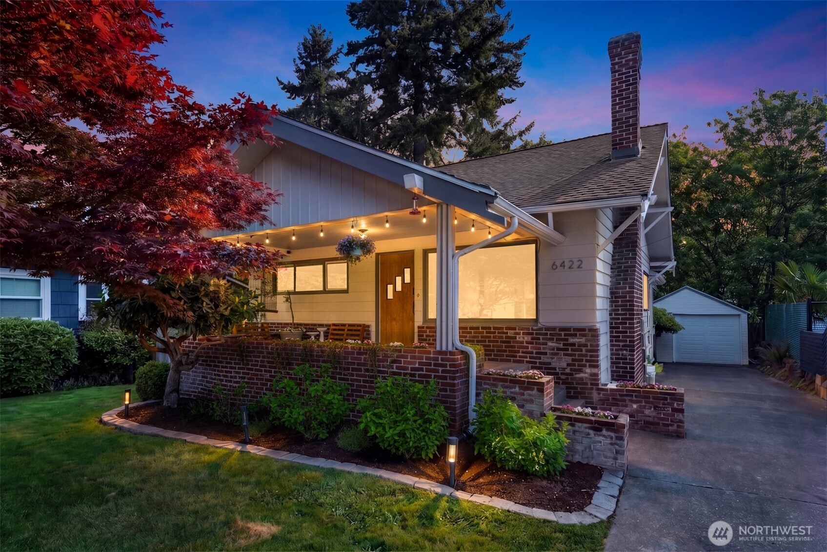 6422 49th Avenue Southwest Seattle, WA 98136 - Photo 3 of 20 a front view of a house with garden