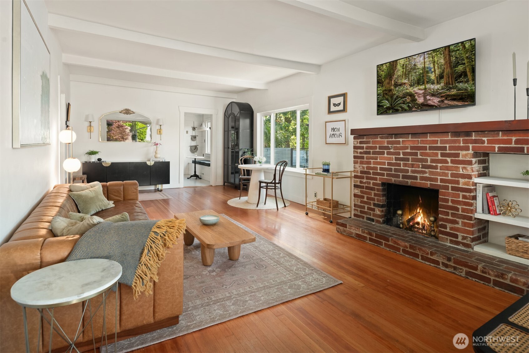 6422 49th Avenue Southwest Seattle, WA 98136 - Photo 5 of 20 a living room with furniture and a fireplace