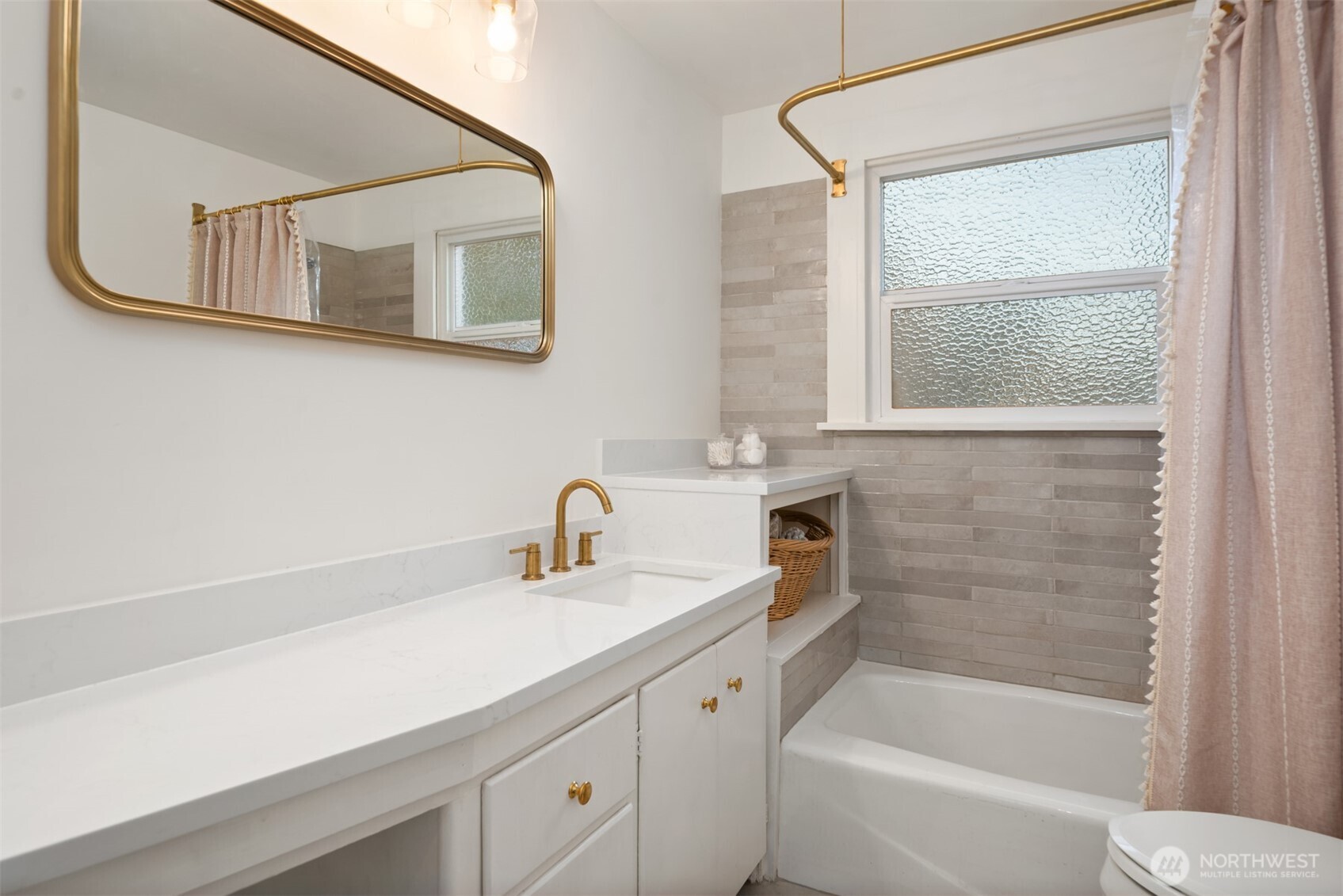 6422 49th Avenue Southwest Seattle, WA 98136 - Photo 8 of 20 a bathroom with a sink and a bathtub