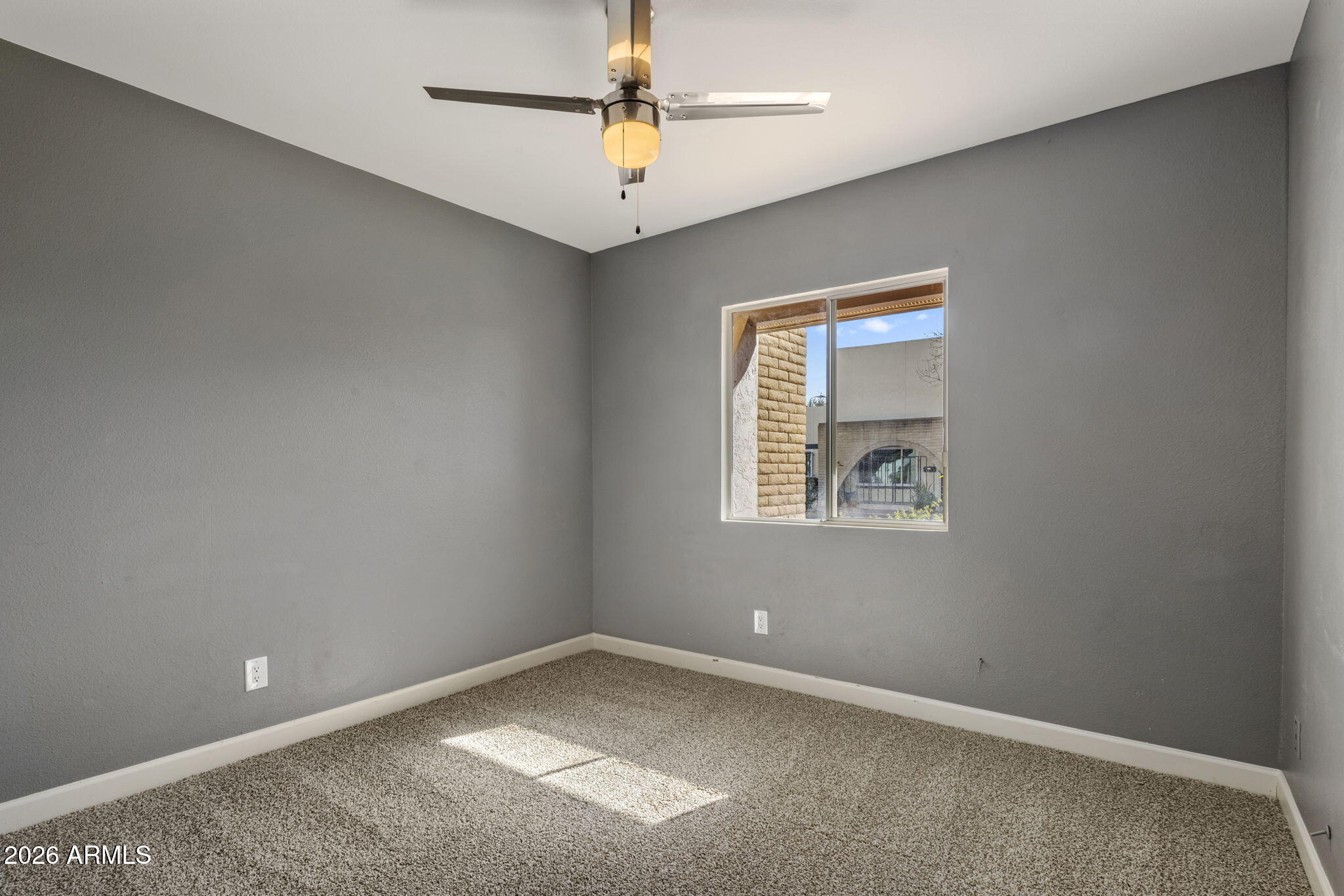 1842 West Marlette Avenue Phoenix, AZ 85015 - Photo 18 of 30 an empty room with a window