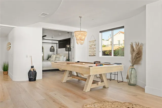 a view of living room filled with furniture and window
