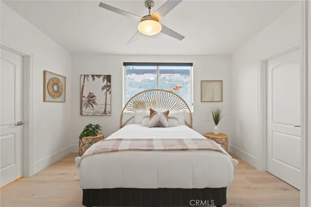a kitchen with granite countertop white cabinets a sink and dishwasher