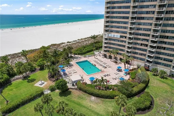 a view of a lake with a building in the background