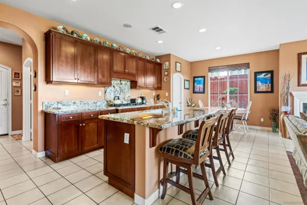 a view of room with window and furniture
