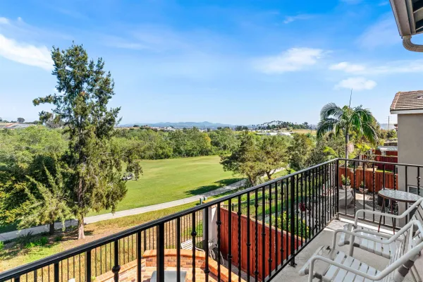 a spacious bathroom with a tub sink and mirror
