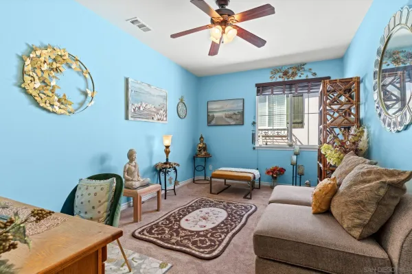 a bathroom with a sink mirror vanity and toilet