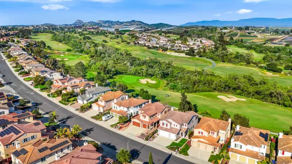 front view of a house with a street