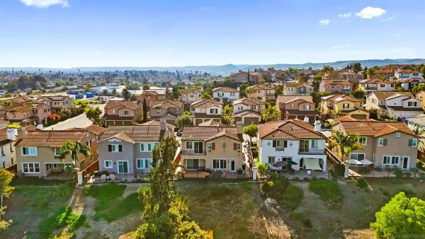 a view of a house with a park