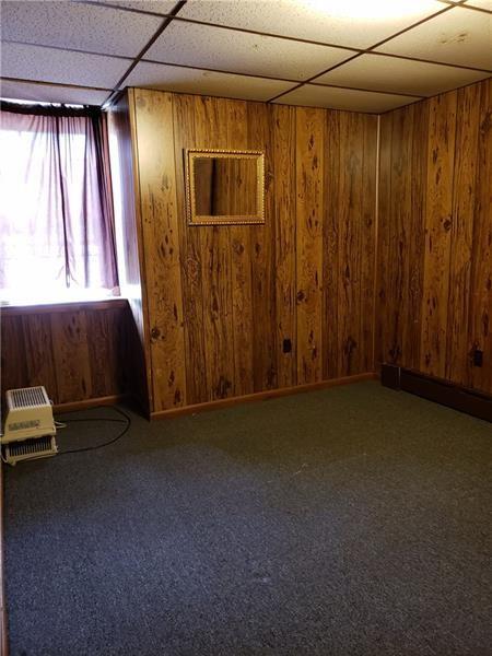 1120 East Swissvale Avenue, Unit 3 FRONT Pittsburgh, PA 15221 - Photo 14 of 14 an empty room with windows