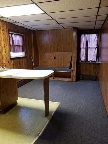 a room with furniture and window