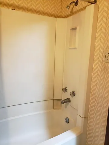 a bathroom with a bathtub