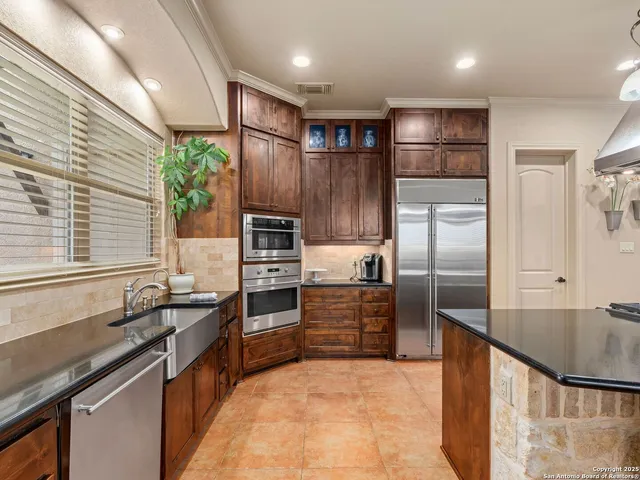 a kitchen with a sink and a window