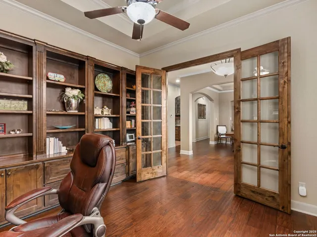 a bathroom with a toilet a sink and a mirror