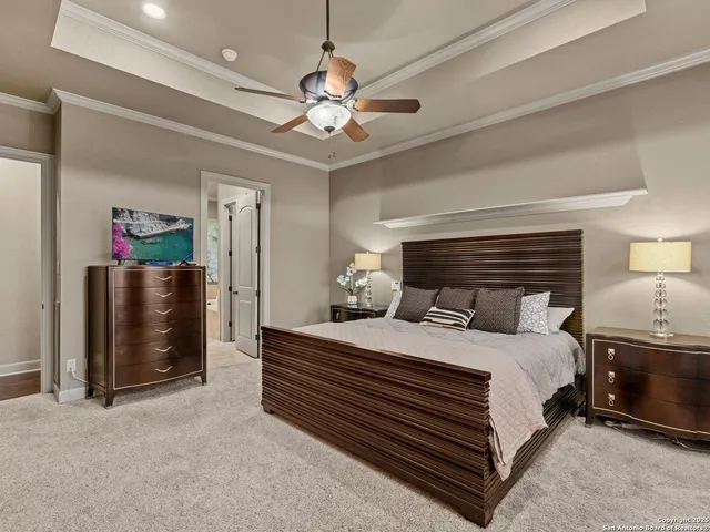 a large bathroom with a tub a sink and mirror